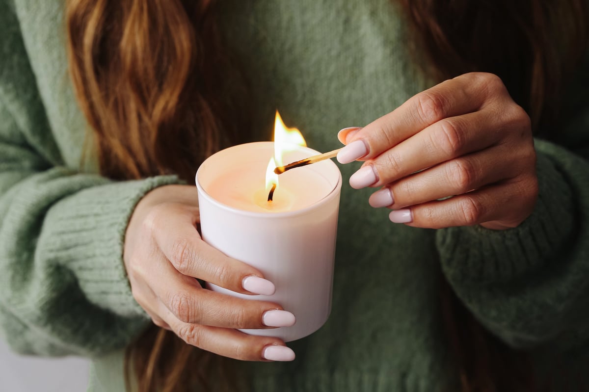 cozy candlelit ambiance, warm soft glow candle, peaceful evening atmosphere